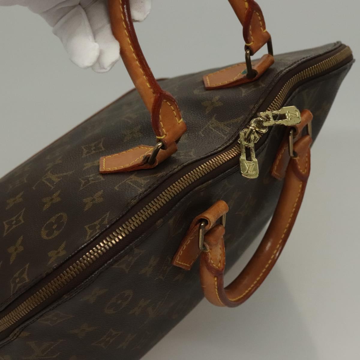 Monogram Alma Hand Bag